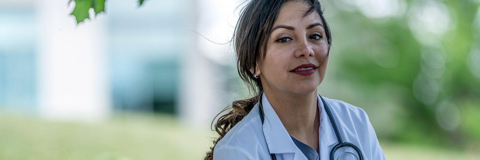 Nurse outside in a natural landscape